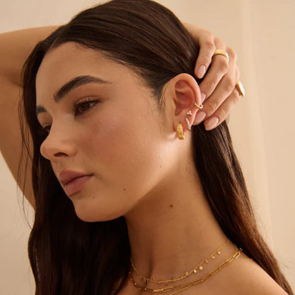 Cosmic Love Huggie with White Topaz in 18KT Yellow Gold Plate