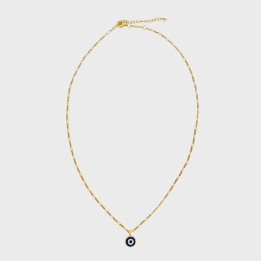 Gold necklace with a small evil eye pendant on a light gray background
