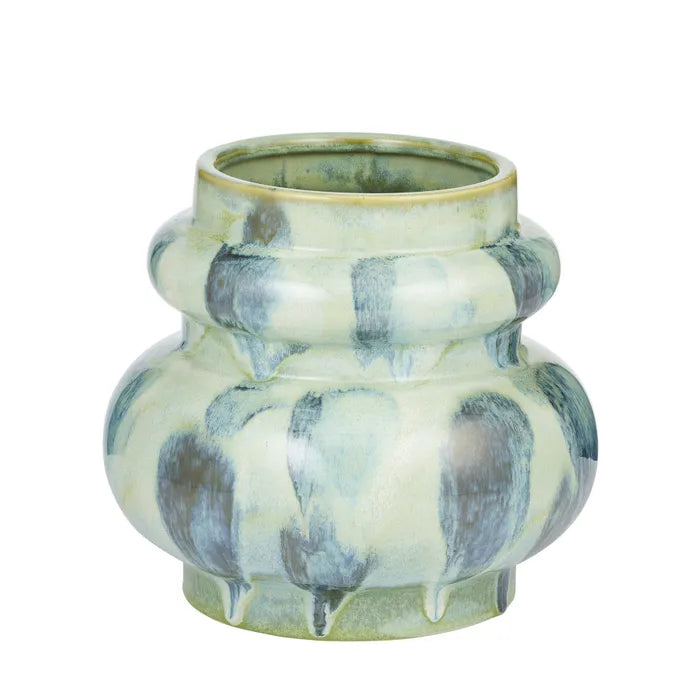 Ceramic vase with a marbled design on a white background