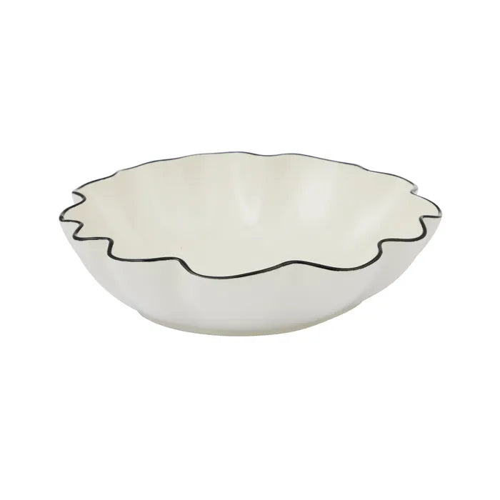 White ceramic bowl with black rim on a white background